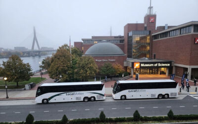 Managing Multi-Vehicle Logistics: How Local Motion Coordinates Groups of 3 to 3,000